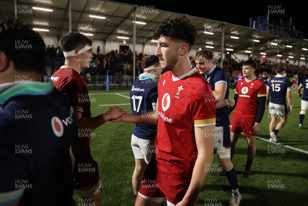 070325 - Scotland U20s v Wales U20s - U20s 6 Nations Championship - Elis Price of Wales shakes hands with opposition team at full time