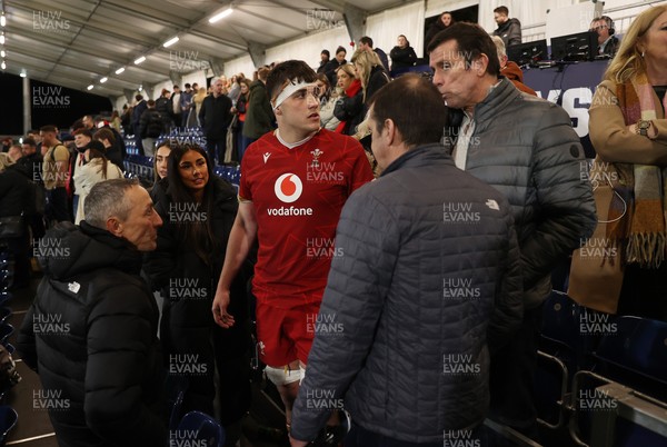 070325 - Scotland U20s v Wales U20s - U20s 6 Nations Championship - Kenzie Jenkins of Wales with family at full time