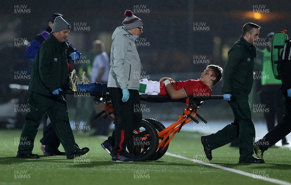 100223 - Scotland U20s v Wales U20s - U20s 6 Nations Championship - Huw Davies of Wales is stretchered off the field injured