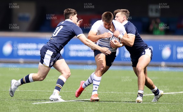 010721 - Scotland v Italy - U20s 6 Nations Championship - Filippo Drago of Italy is tackled by Scott King and Cameron Scott of Scotland