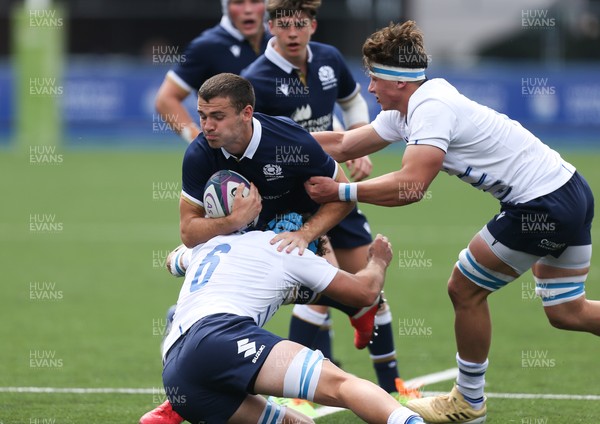 010721 - Scotland U20 v Italy U20, 2021 Six Nations U20 Championship - Elliot Gourlay of Scotland is tackled by Luca Andreani of Italy