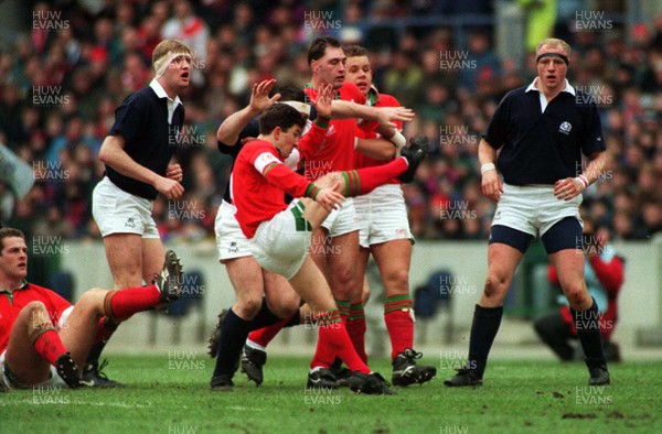 040395 - Scotland v Wales - Five Nations - Robert Jones clears the ball