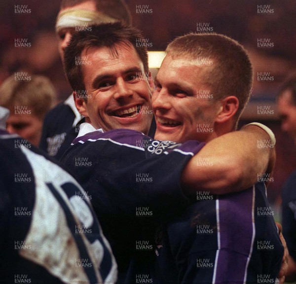 060299 - Scotland v Wales - Five Nations - Kenny Logan and Cameron Murray of Scotland celebrate victory