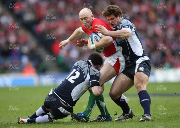 08.02.09 - Scotland v Wales, RBS Six Nations 2009. -  Wales' Tom Shanklin is tackled by Scotlands Graeme Morrison and  Ross Ford  