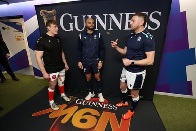 080325 - Scotland v Wales - Guinness 6 Nations Championship - Jac Morgan of Wales and Finn Russell of Scotland at the coin toss