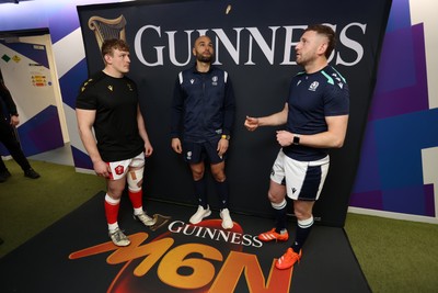 080325 - Scotland v Wales - Guinness 6 Nations Championship - Jac Morgan of Wales and Finn Russell of Scotland at the coin toss