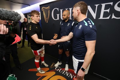 080325 - Scotland v Wales - Guinness 6 Nations Championship - Jac Morgan of Wales and Finn Russell of Scotland at the coin toss