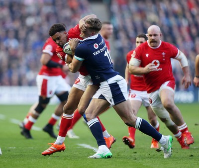 080325 - Scotland v Wales - Guinness 6 Nations Championship - Ben Thomas of Wales is tackled by Duhan van der Merwe of Scotland 