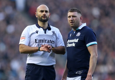 080325 - Scotland v Wales - Guinness 6 Nations Championship - Referee Andrea Piardi with Finn Russell of Scotland 