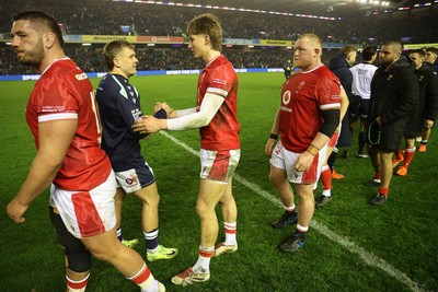 080325 - Scotland v Wales - Guinness 6 Nations Championship - Ellis Mee of Wales shakes hands with opposition team at full time