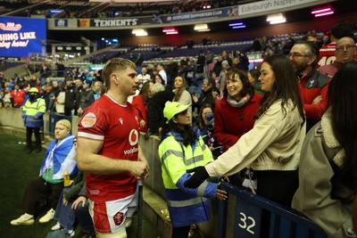 080325 - Scotland v Wales - Guinness 6 Nations Championship - Aaron Wainwright of Wales with family at full time