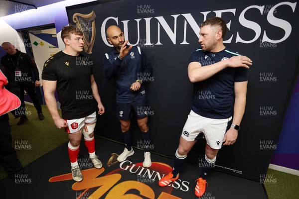 080325 - Scotland v Wales - Guinness 6 Nations Championship - Jac Morgan of Wales and Finn Russell of Scotland at the coin toss