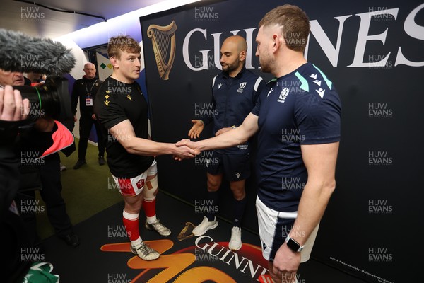 080325 - Scotland v Wales - Guinness 6 Nations Championship - Jac Morgan of Wales and Finn Russell of Scotland at the coin toss