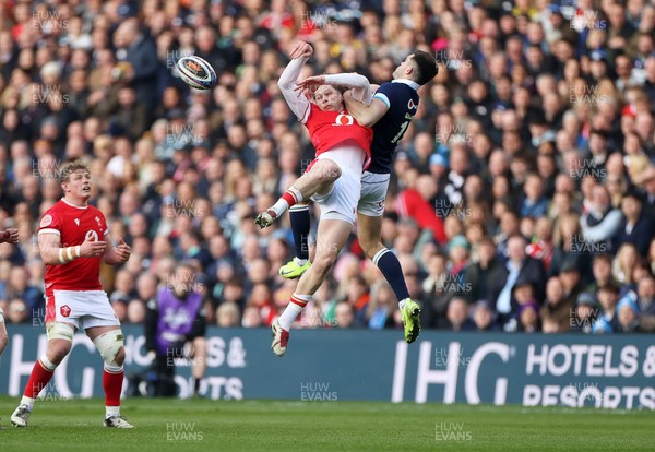 080325 - Scotland v Wales - Guinness 6 Nations Championship - Ellis Mee of Wales collides with Blair Kinghorn of Scotland in the air