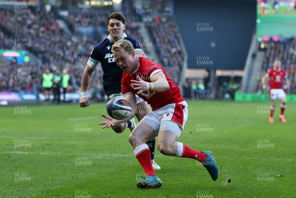 080325 - Scotland v Wales - Guinness 6 Nations Championship - Blair Murray of Wales gets his hands on the ball to score a try