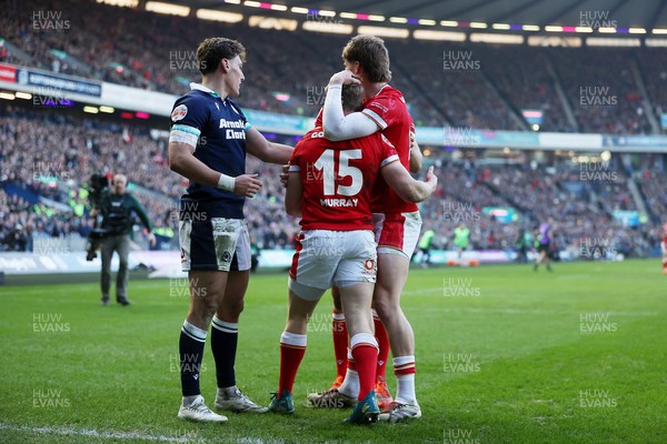 080325 - Scotland v Wales - Guinness 6 Nations Championship - Blair Murray of Wales celebrates scoring a try with team mates