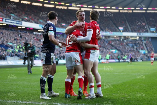 080325 - Scotland v Wales - Guinness 6 Nations Championship - Blair Murray of Wales celebrates scoring a try with team mates