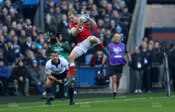 080325 - Scotland v Wales - Guinness 6 Nations Championship - Blair Murray of Wales leaps for the ball