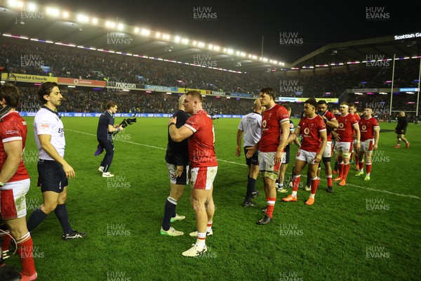 080325 - Scotland v Wales - Guinness 6 Nations Championship - Wales shake hands with opposition team at full time