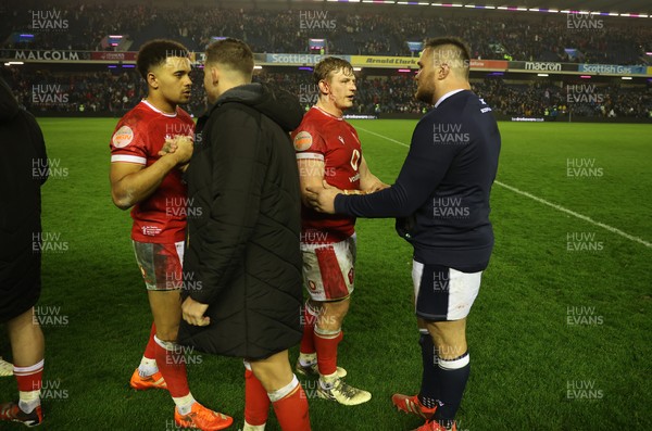 080325 - Scotland v Wales - Guinness 6 Nations Championship - Jac Morgan of Wales shakes hands with opposition team at full time