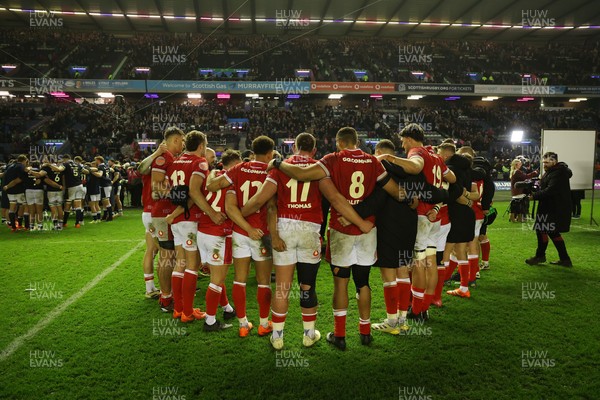 080325 - Scotland v Wales - Guinness 6 Nations Championship - Wales team huddle at full time