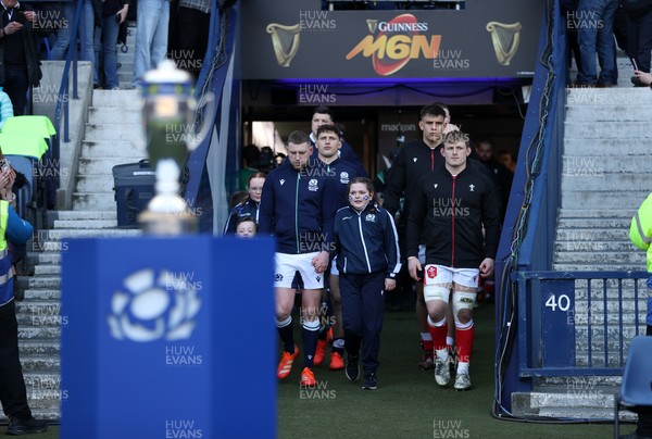 080325 - Scotland v Wales - Guinness 6 Nations Championship - Finn Russell of Scotland and Jac Morgan of Wales walk out the tunnel