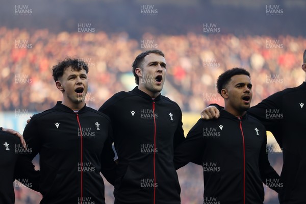 080325 - Scotland v Wales - Guinness 6 Nations Championship - Tom Rogers, Max Llewellyn and Ben Thomas sing the anthem