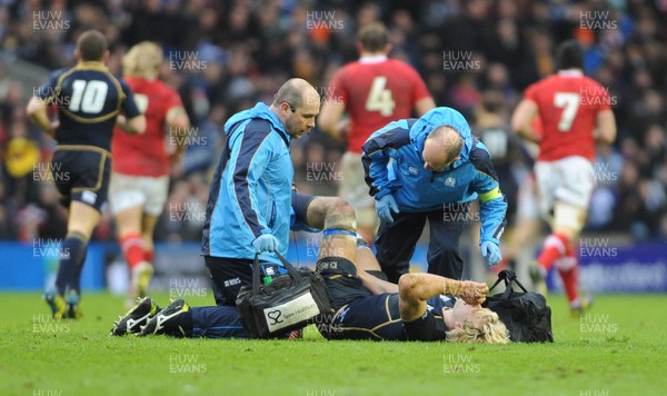 090313 - Scotland v Wales - RBS Six Nations 2013 -Richie Gray of Scotland is treated for injury