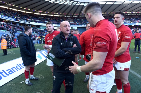 090319 - Scotland v Wales - Guinness Six Nations - Shaun Edwards talks to Josh Adams of Wales at the end of the game