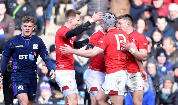 090319 - Scotland v Wales - Guinness Six Nations - Jonathan Davies of Wales celebrates his try with Liam Williams and Josh Adams