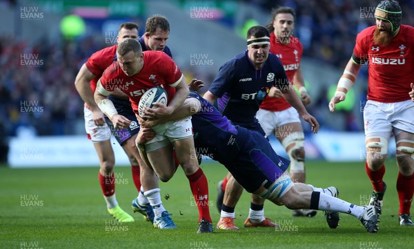 090319 - Scotland v Wales - Guinness 6 Nations - Hadleigh Parkes of Wales is tackled by Jonny Gray of Scotland