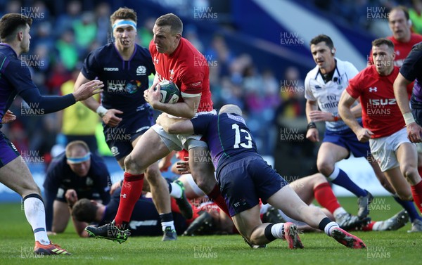 090319 - Scotland v Wales - Guinness 6 Nations - Hadleigh Parkes of Wales is tackled by Nick Grigg of Scotland
