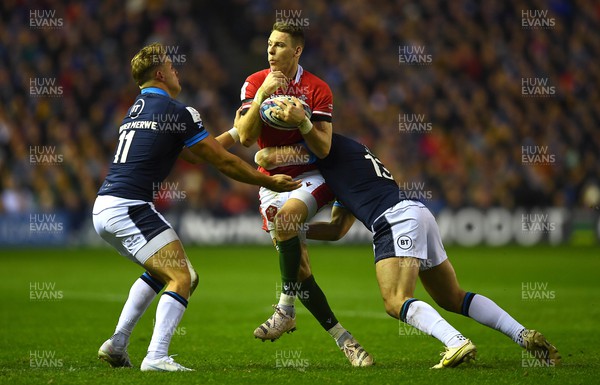 110223 - Scotland v Wales - Guinness Six Nations 2023 - Liam Williams of Wales is tackled by Duhan van der Merwe and Huw Jones of Scotland