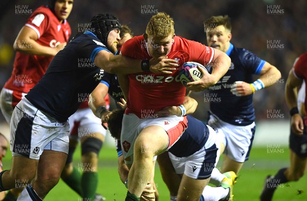 110223 - Scotland v Wales - Guinness Six Nations 2023 - Rhys Carre of Wales is tackled by Zander Fagerson of Scotland