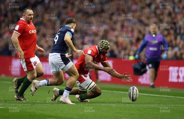 110223 - Scotland v Wales - Guinness 6 Nations Championship - Christ Tshiunza of Wales dives on the loose ball