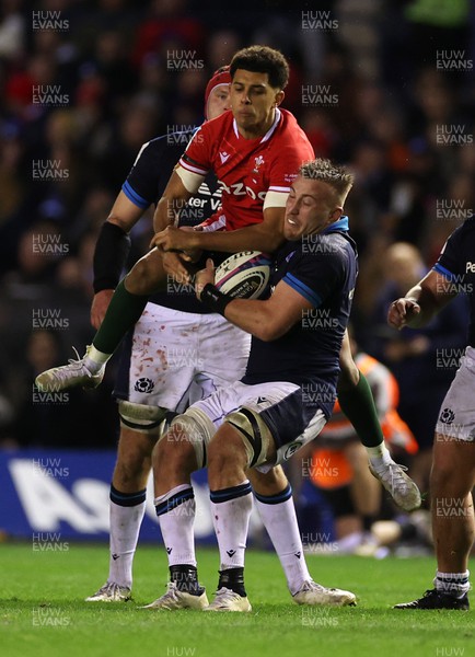 110223 - Scotland v Wales - Guinness 6 Nations Championship - Rio Dyer of Wales and Matt Fagerson of Scotland go for the ball