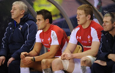 12.02.11 - Scotland v Wales - RBS Six Nations 2011 - Lee Byrne and Bradley Davies of Wales look on from the bench after being shown yellow cards. 
