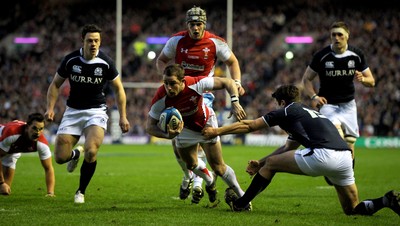 12.02.11 - Scotland v Wales - RBS Six Nations 2011 - Shane Williams of Wales is tackled by Hugo Southwell of Scotland. 