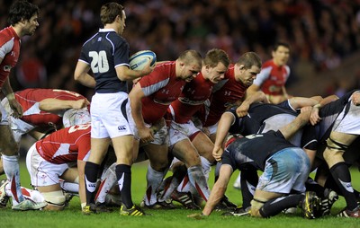 12.02.11 - Scotland v Wales - RBS Six Nations 2011 - Craig Mitchell, Matthew Rees and Paul James of Wales pack down. 