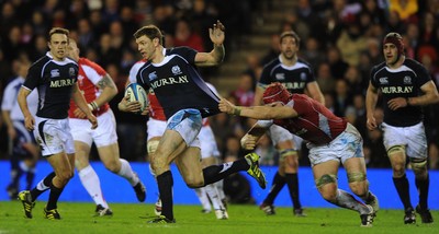 12.02.11 - Scotland v Wales - RBS Six Nations 2011 - Nikki Walker of Scotland is tackled by Alun Wyn Jones of Wales. 