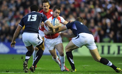 12.02.11 - Scotland v Wales - RBS Six Nations 2011 - Shane Williams of Wales takes on Joe Ansbro(L) and Nikki Walker of Scotland. 