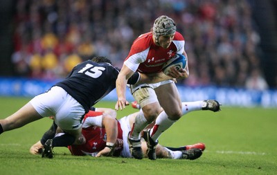 12.02.11 - Scotland v Wales... Wales Jonathan Davies is tackled by Hugo Southwell. 