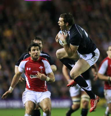 12.02.11 - Scotland v Wales... Scotland's Sean Lamont takes high ball as Mike Phillips watches.. 