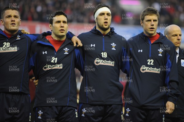 12.02.11 - Scotland v Wales - RBS Six Nations 2011 - Tavis Knoyle, Stephen Jones, Josh Turnbull and Rhys Priestland of Wales line up for the national anthems. 