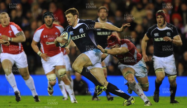 12.02.11 - Scotland v Wales - RBS Six Nations 2011 - Nikki Walker of Scotland is tackled by Alun Wyn Jones of Wales. 