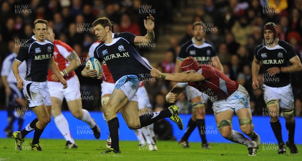 12.02.11 - Scotland v Wales - RBS Six Nations 2011 - Nikki Walker of Scotland is tackled by Alun Wyn Jones of Wales. 