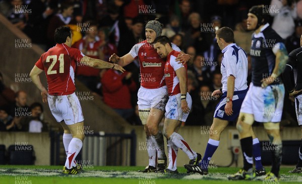 12.02.11 - Scotland v Wales - RBS Six Nations 2011 - Shane Williams of Wales celebrates his try with Jonathan Davies and Stephen Jones. 