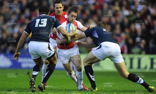 12.02.11 - Scotland v Wales - RBS Six Nations 2011 - Shane Williams of Wales takes on Joe Ansbro(L) and Nikki Walker of Scotland. 