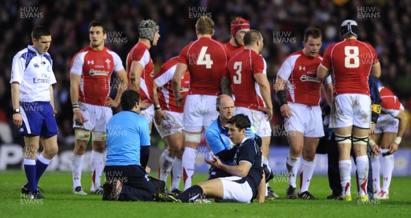 12.02.11 - Scotland v Wales - RBS Six Nations 2011 - Hugo Southwell of Scotland is treated after a collision. 