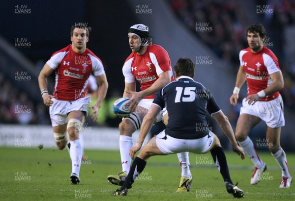 12.02.11 - Scotland v Wales... Wales Ryan Jones takes on Hugo Southwell. 
